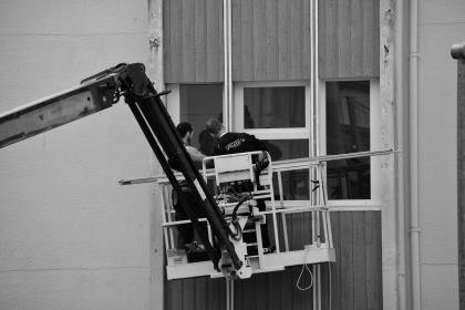 Workers on a high-rise facade