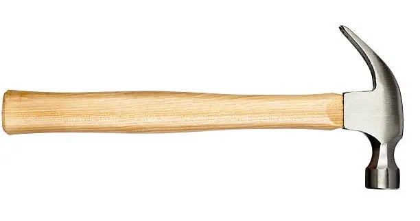 A claw hammer on a clean surface