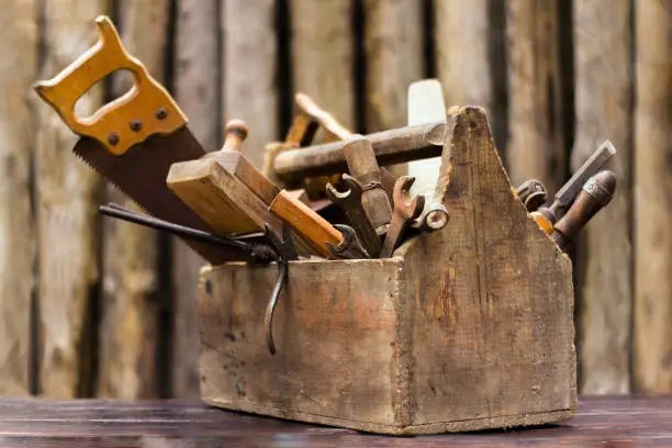 Aged wooden toolbox showing years of reliable work